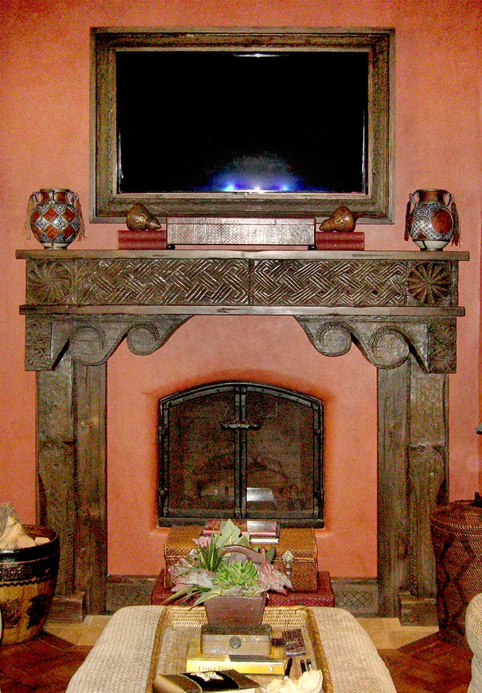 fireplace mantel and television frame