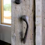 Handle detail on rustic front entry