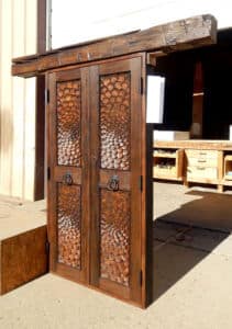 Carved closet doors with lintel