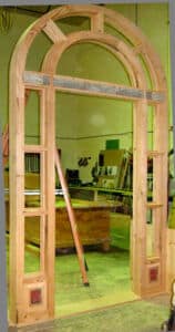 Arched door with transom in progress