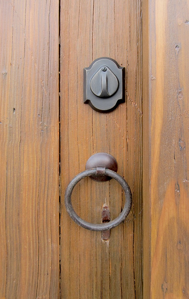 arched door with deadbolt with teardrop key flap