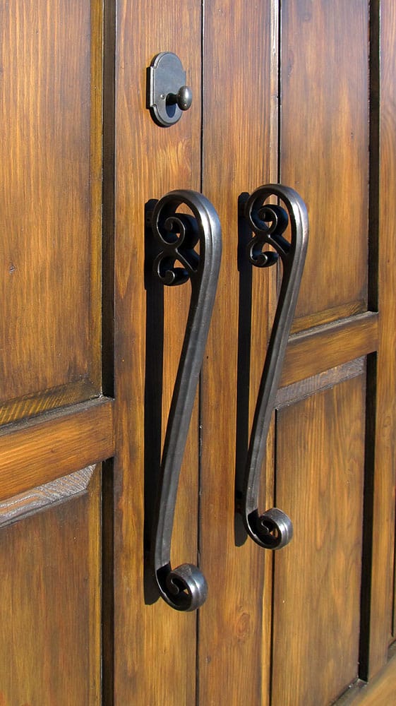 large double doors with swirling handle