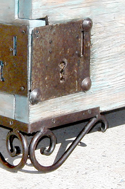 Antique keyplate on bed