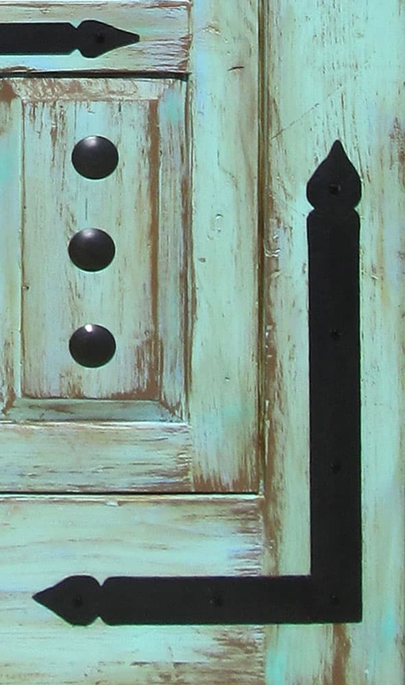 arched door with L-straps with flourish