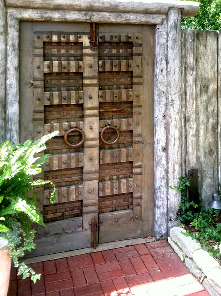 Gate with iron strapping