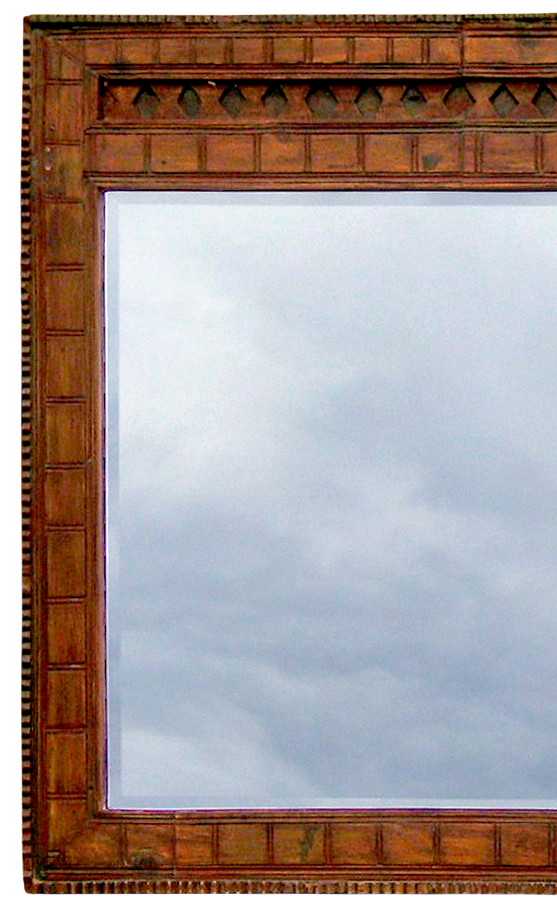 Carved mirror