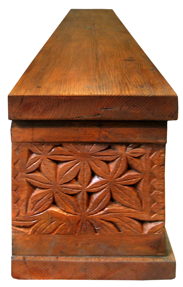 This carved mantel was made with salvaged Douglas fir. It was then inset with antique carved panels and finished in a warm golden patina.