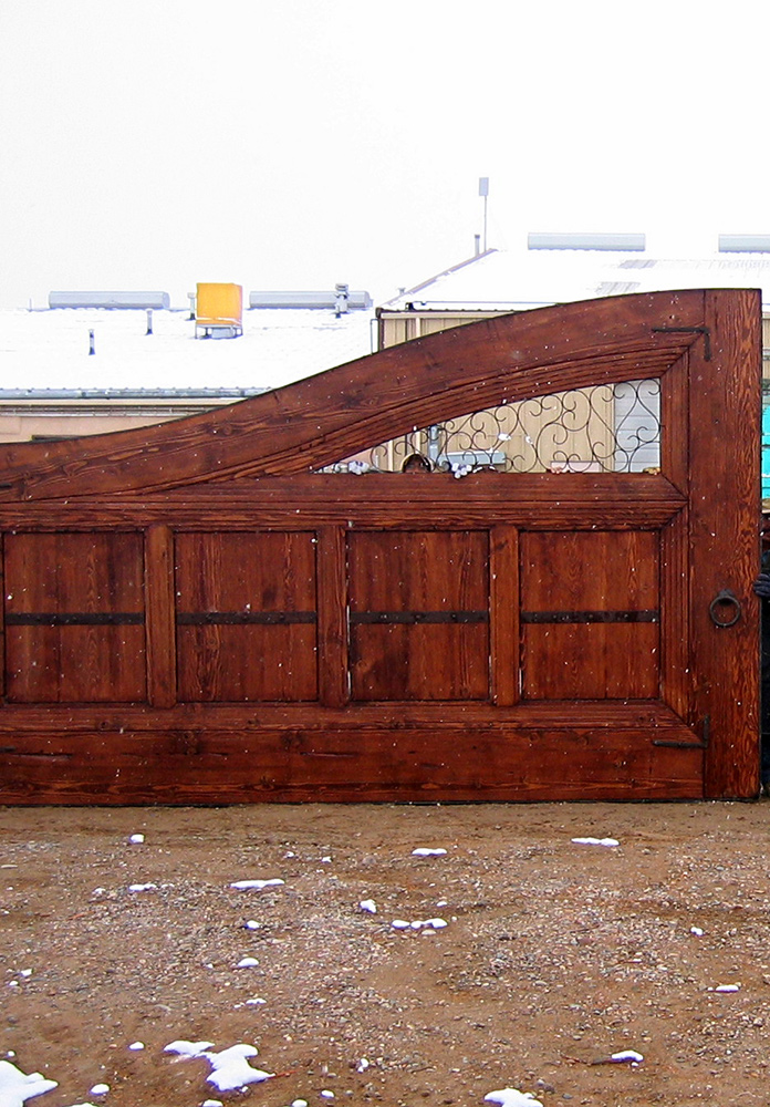 Wooden car dealership gates