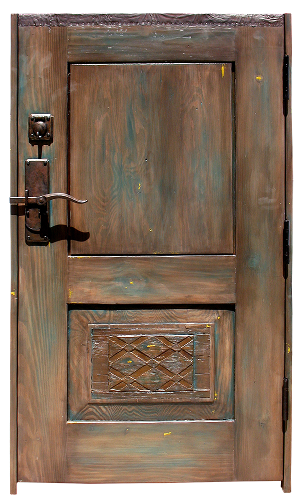 Solid wood entry gate crafted using antique carved panels, reclaimed Douglas fir and stamped tin to trim the top. It features hand cast bronze handle hardware with deadbolt.